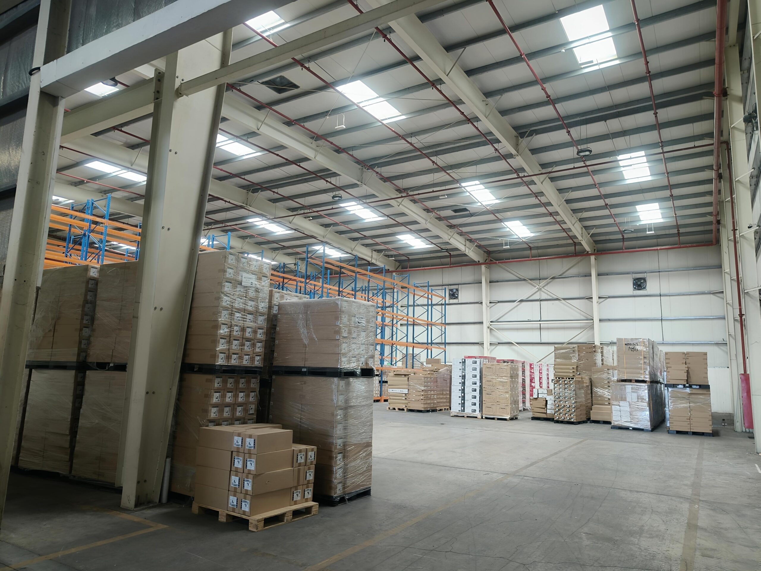 Whizz Exim warehouse interior — main floor